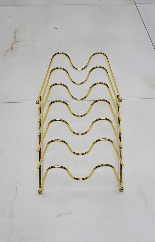Metallic golden plates stand