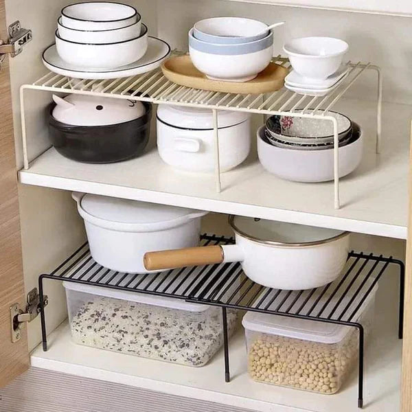 Expandable shelf raiser