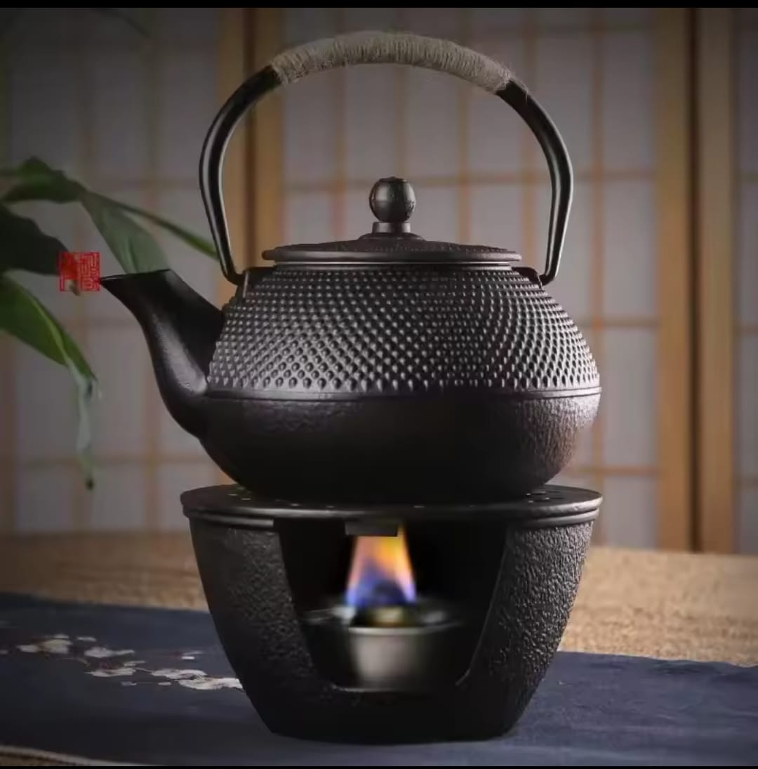 Original heavy duty cast iron tea pot with infuser, cast iron coaster and spoon