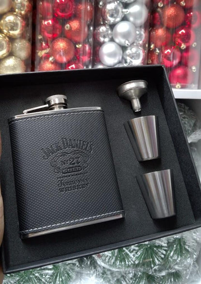 Jack Daniels branded whiskey flask with two stainless steel glasses and funnel